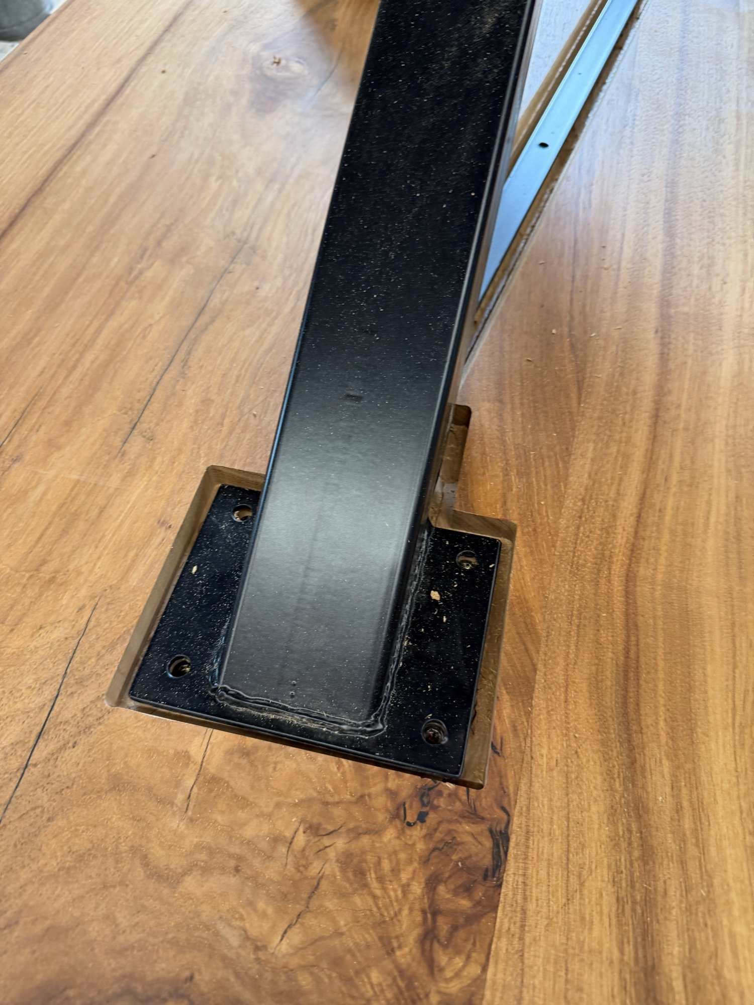 Routed pocket for a table leg